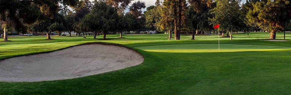 golf course putting green sand trap red flag